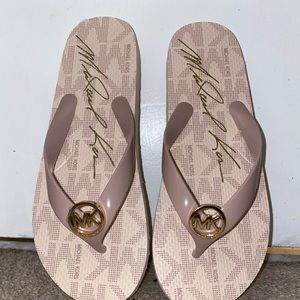 Light Pink Michael Kors Flip Flops. Never worn.